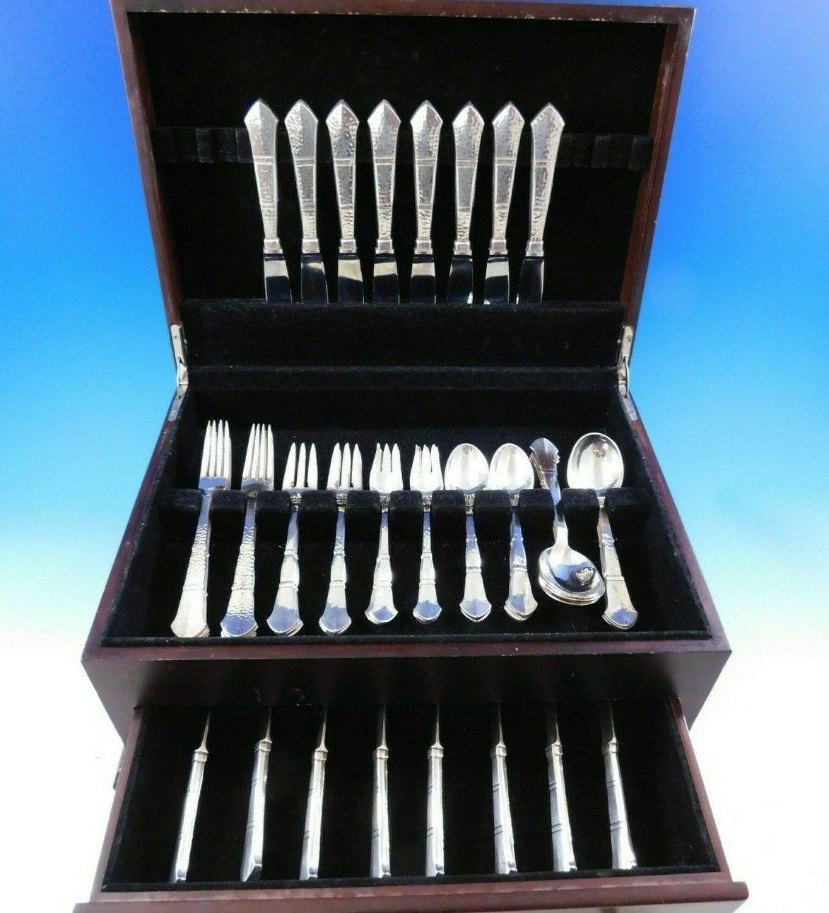 Antik by E. Dragsted Danish Mid-Century Modern sterling silver flatware set, 56 pieces. This scarce handmade set includes:

8 knives, serrated, 8