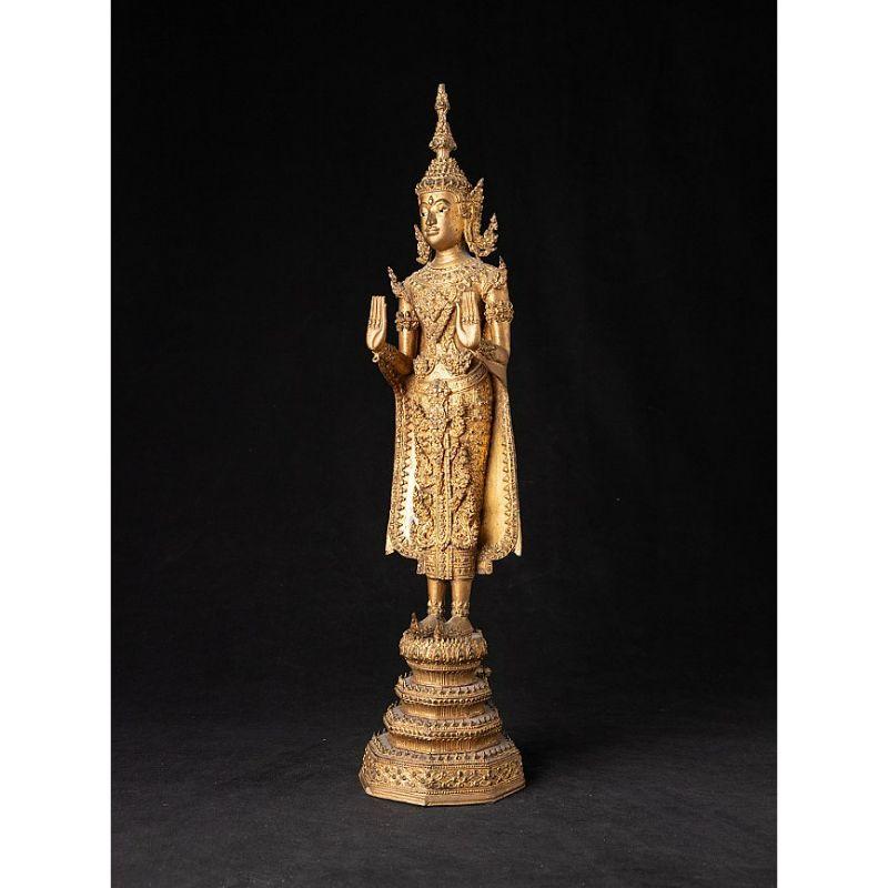 Material: bronze
54,5 cm high 
12,8 cm wide and 13 cm deep
Weight: 3.96 kgs
Gilded with 24 krt. gold
Abhaya mudra
Originating from Thailand
19th century.

