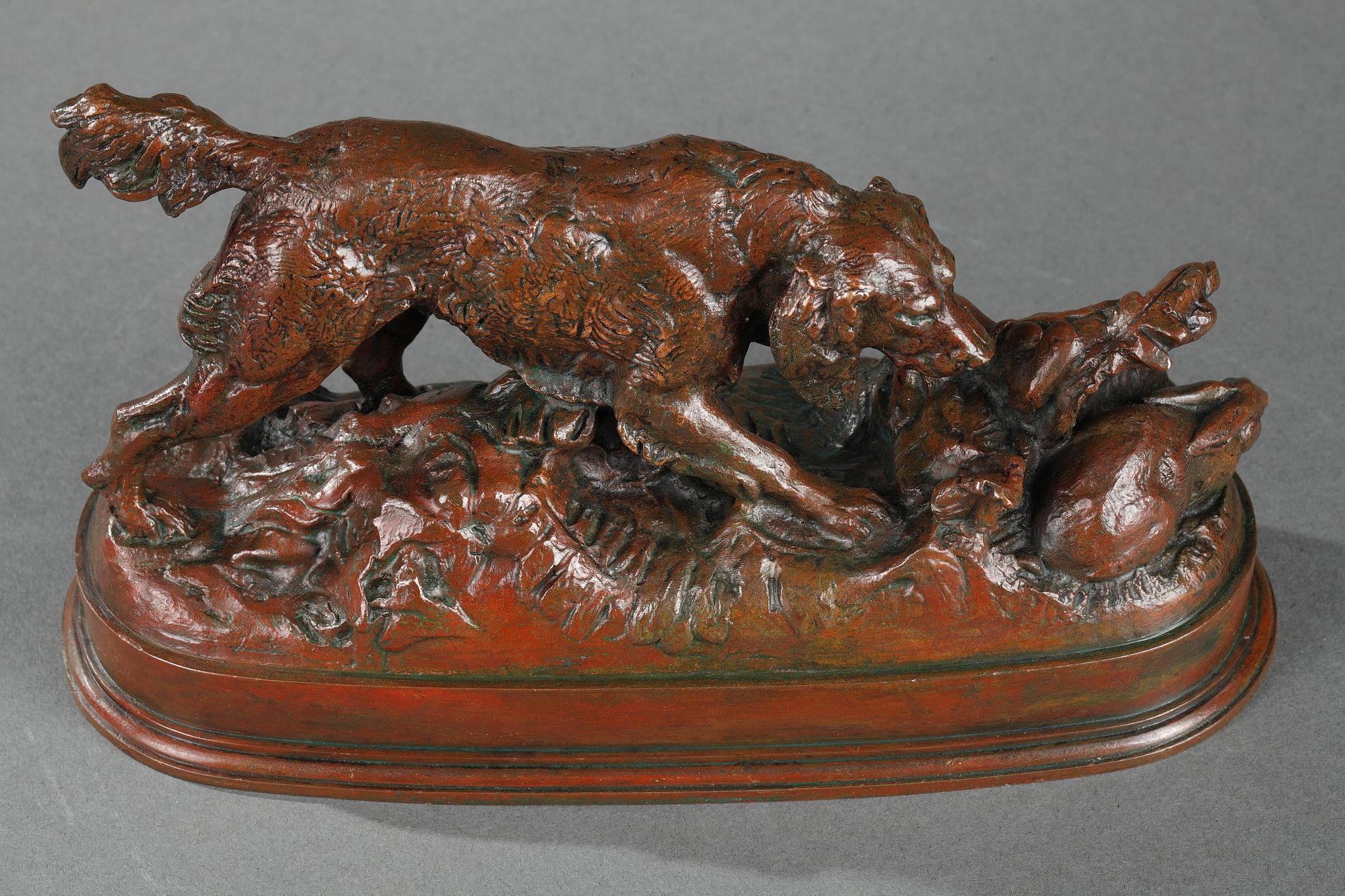 Antoine-Louis Barye Figurative Sculpture - A spaniel pointing a rabbit