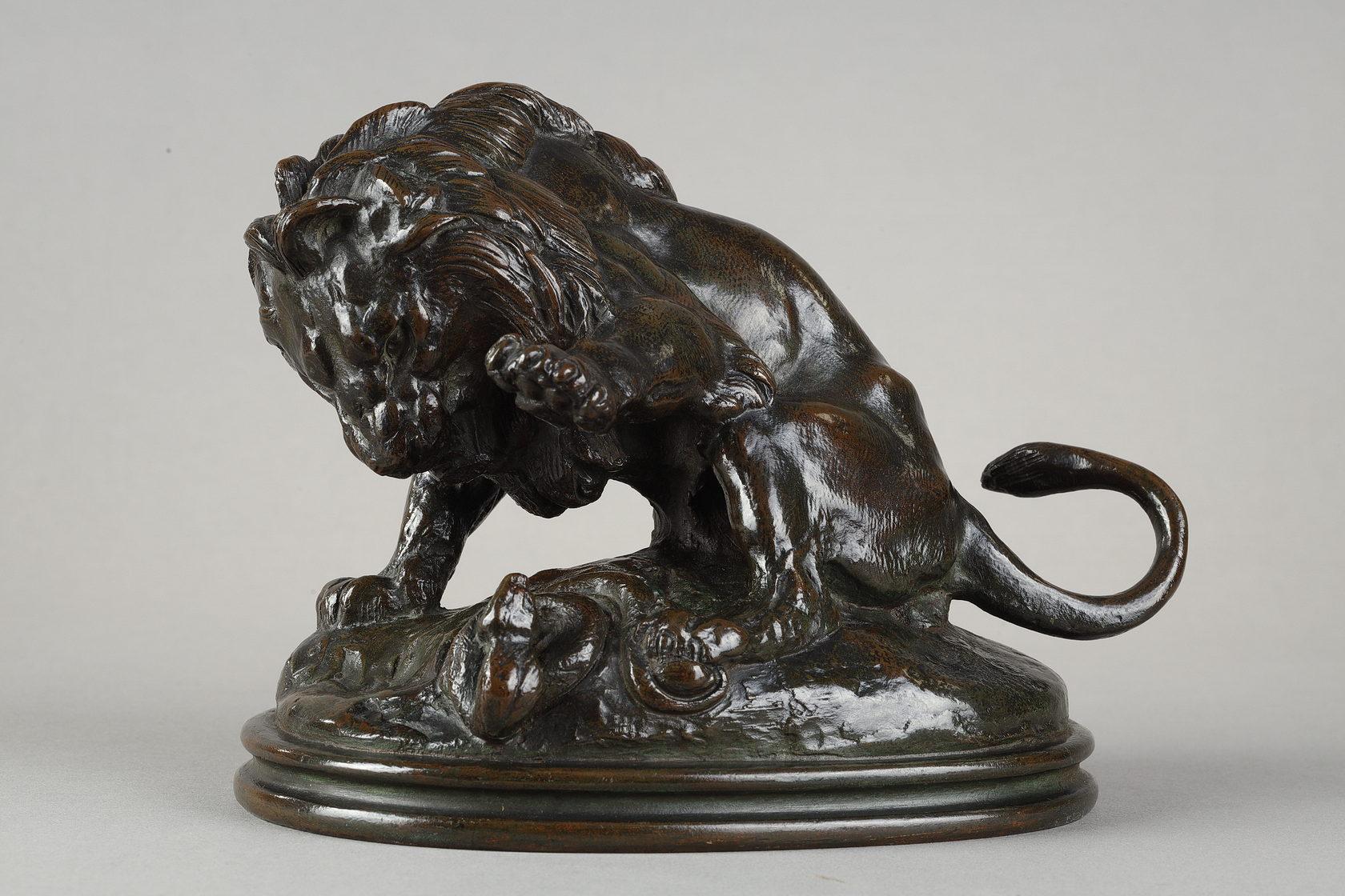 Antoine-Louis Barye Figurative Sculpture - Lion and snake