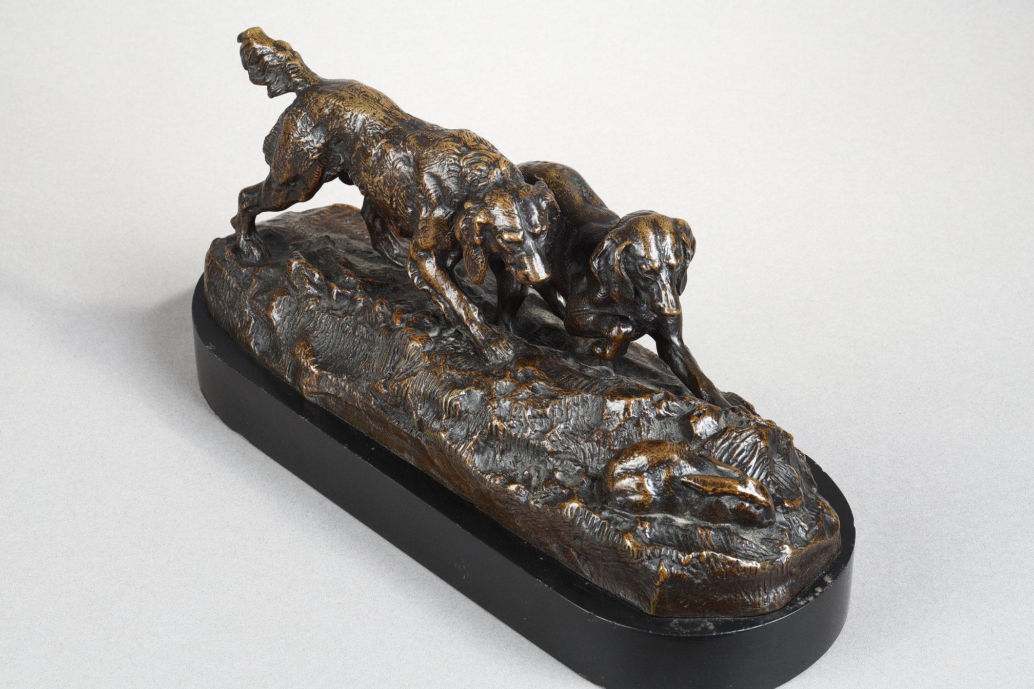 Two dogs pointing a rabbit
by Antoine-Louis BARYE (1796-1875)

A rare bronze group with nuanced dark brown patina
signed on the base 