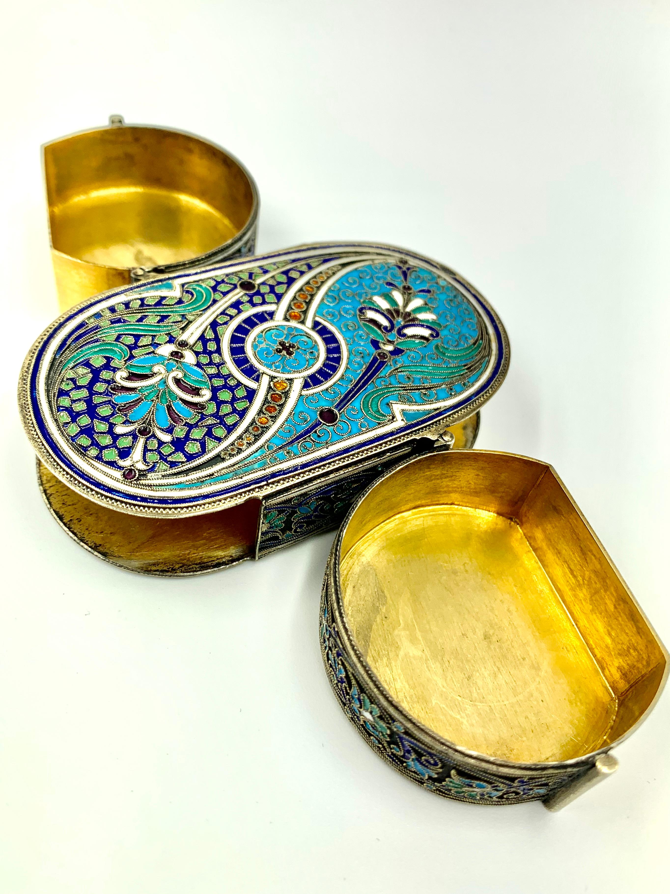 Fine and rare antique Russian silver and enamel double sided yin/yang snuff box by Antip Kuzmichev. This exquisite snuff box opens on the sides rather than at the top to reveal two hidden gilded silver compartments, both hinged and fully hallmarked.