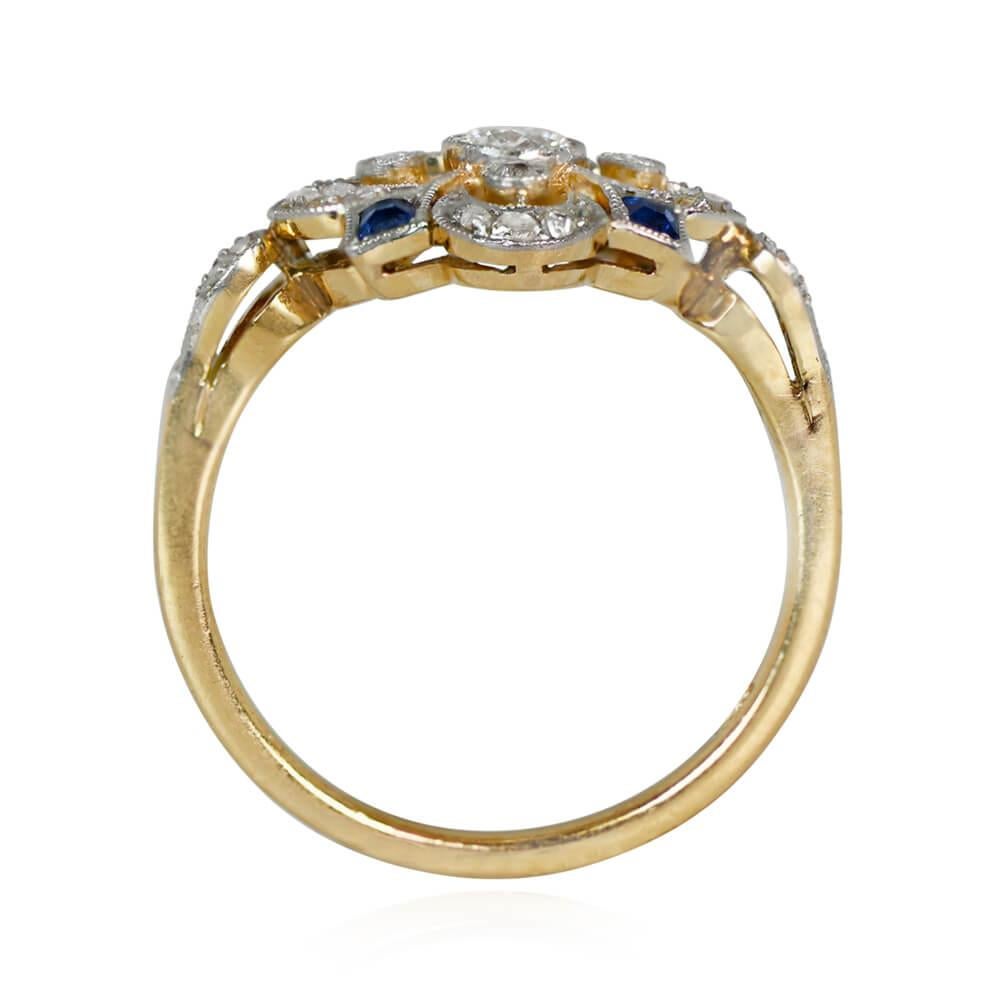 Antique Edwardian Diamond Ring: An exquisite piece from the Edwardian era, this ring highlights a central old European cut diamond, around 0.17 carats, with a captivating J color and SI2 clarity. The center stone is encircled by four bezel-set