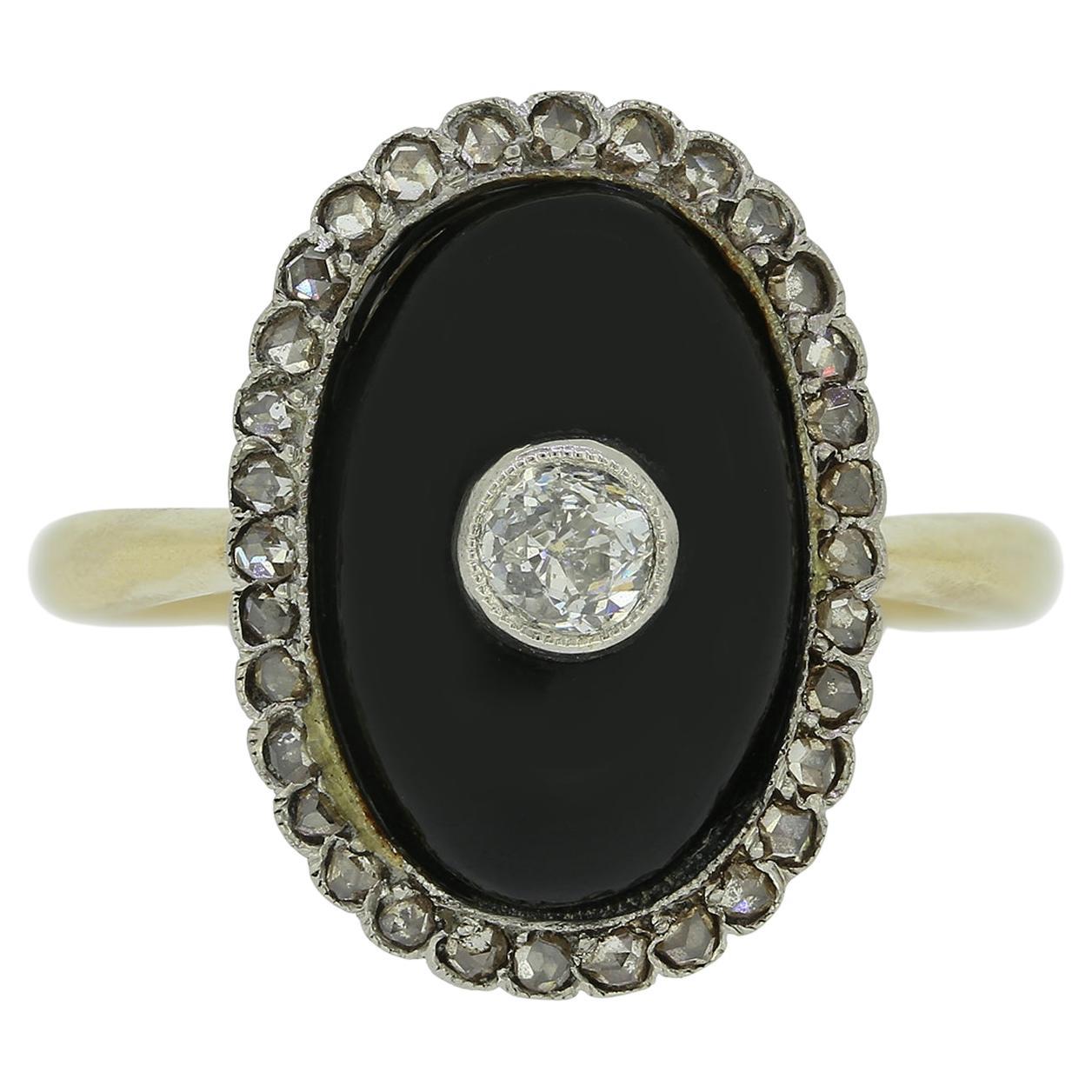 Antique 0.20 Carat Diamond and Onyx Ring For Sale