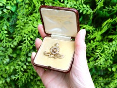 Antique 0.22 Carat Diamond and 18k Yellow Gold Royal Artillery Brooch Circa 1930