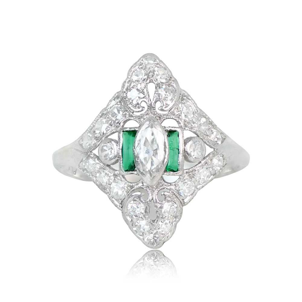 This Art Deco era ring boasts an elegant design, featuring an antique marquise-cut diamond with an approximate weight of 0.35 carats, displaying H color and SI1 clarity. The central diamond is flanked by exquisite baguette-cut natural emeralds and