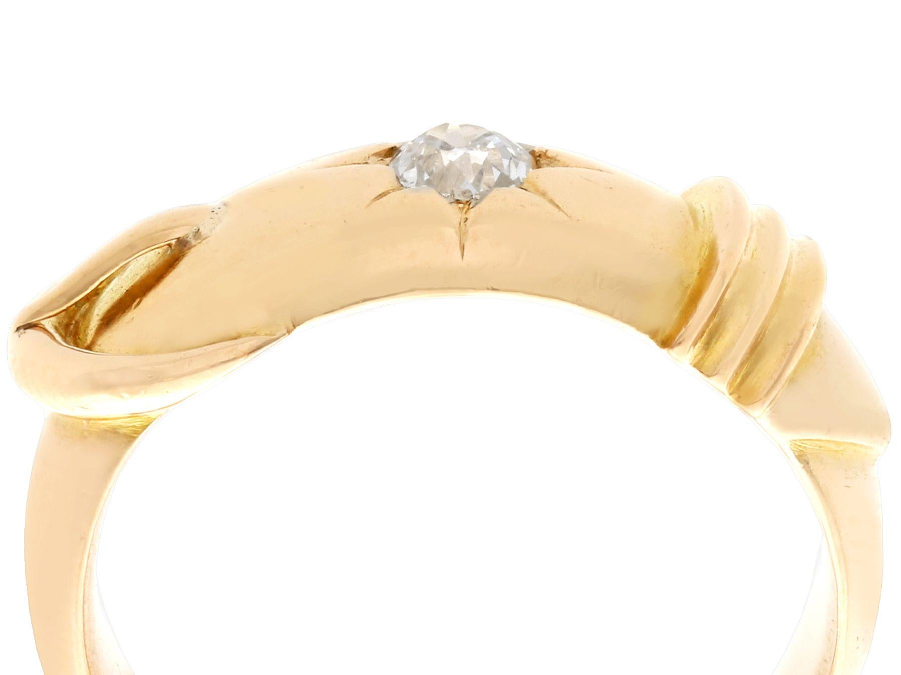A fine and impressive antique 0.38 carat diamond and 18k yellow gold dress ring in the form of a belt and buckle; part of our diverse antique jewelry and estate jewelry collections.

This fine and impressive diamond buckle ring has been crafted in