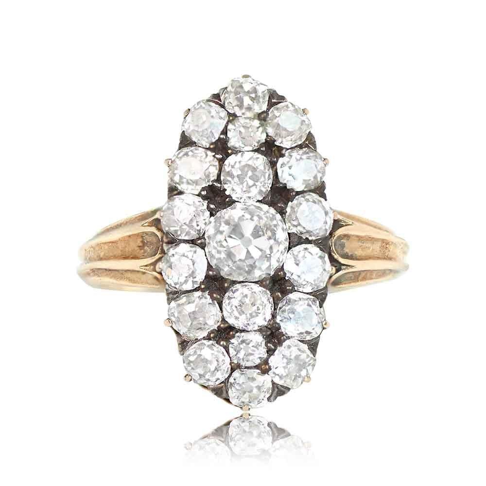 An original Victorian Era ring featuring a cluster of old European cut diamonds. The center stone is an old European cut diamond, approximately 0.45 carats, J color, and SI2 clarity. Surrounding the center stone, additional old mine cut diamonds