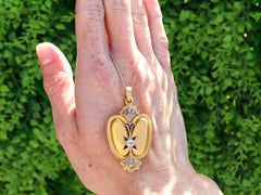 Antique 0.45 Carat Diamond Enamel and 16K Yellow Gold Locket Pendant