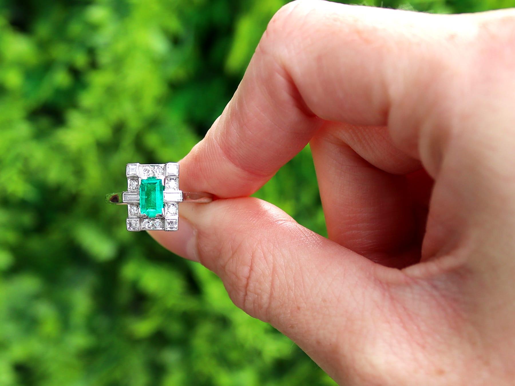 A stunning, fine and impressive antique 0.50 carat emerald and 0.33 carat diamond, 18 karat white gold and platinum set dress ring; part of our diverse collection of Art Deco emerald rings

This stunning, fine and impressive antique 1930s emerald