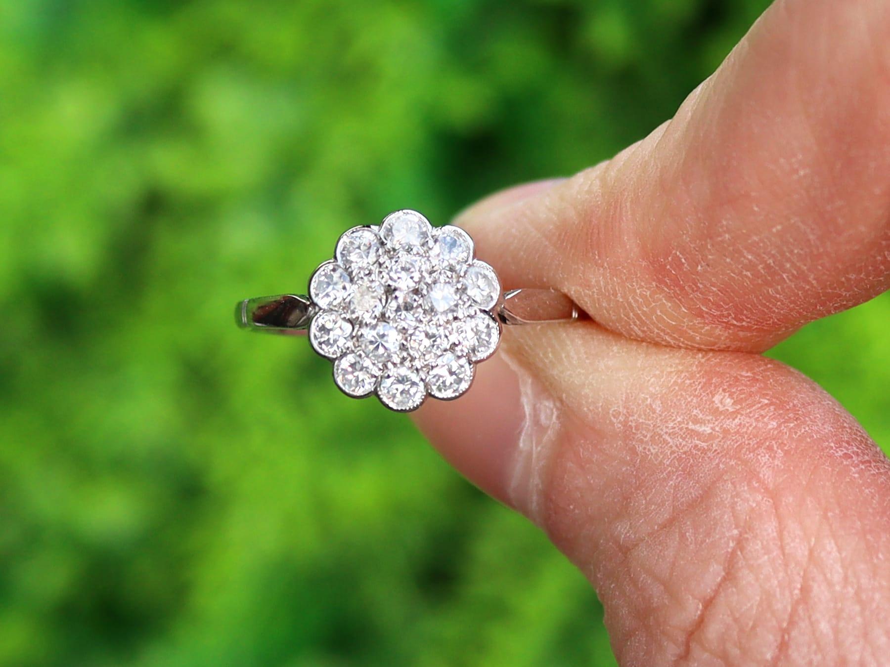 A fine and impressive antique 0.51 carat diamond and platinum cluster style dress ring; part of our diverse antique jewelry and estate jewelry collections.

This fine and impressive 1920s diamond cluster ring has been crafted in platinum.

The