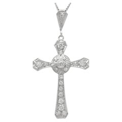 Antique 0.51 Carat Diamond and Platinum Cross Pendant