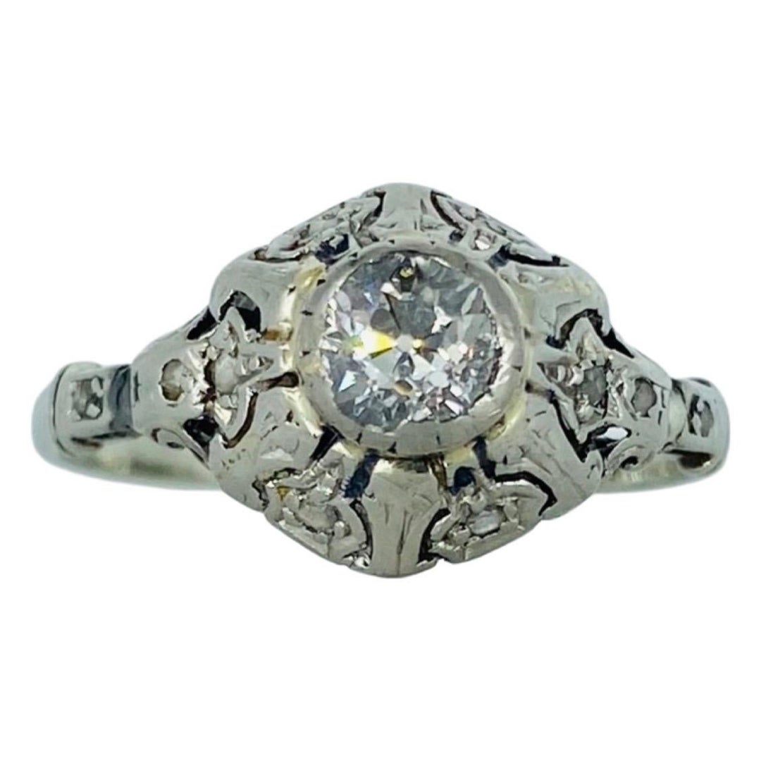 Anillo de compromiso antiguo con diamantes talla europea de 0,56 quilates de peso total