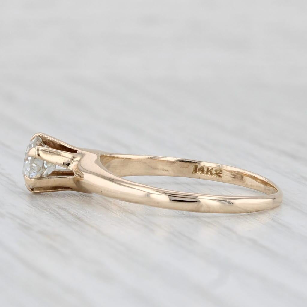 Gemstone Information:
- Natural Diamond -
Carats - 0.58ct 
Cut - Old European 
Color - J - L
Clarity - VS2

Metal: 14k Yellow Gold
Weight: 2.5 Grams 
Stamps: 14k W (Wood & Son Hallmark)
Face Height: 6.2 mm 
Rise Above Finger: 7.8 mm
Band / Shank
