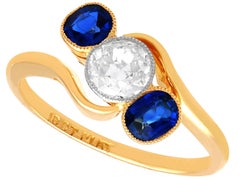 Antique 0.60Ct Sapphire and 0.51Ct Diamond 18k Yellow Gold Twist Ring Circa 1910