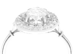 Antique 0.63 Carat Diamond and Platinum Cluster Ring