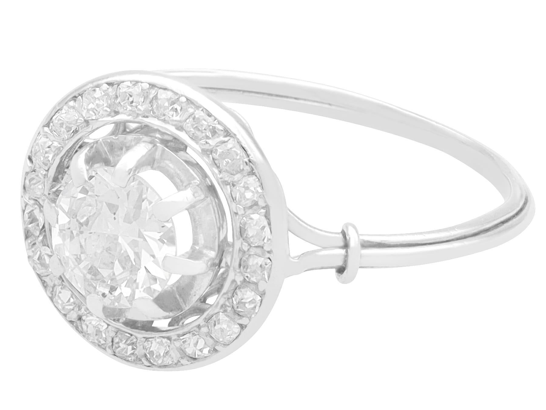 Art Deco Antique 0.63 Carat Diamond and Platinum Cluster Ring For Sale