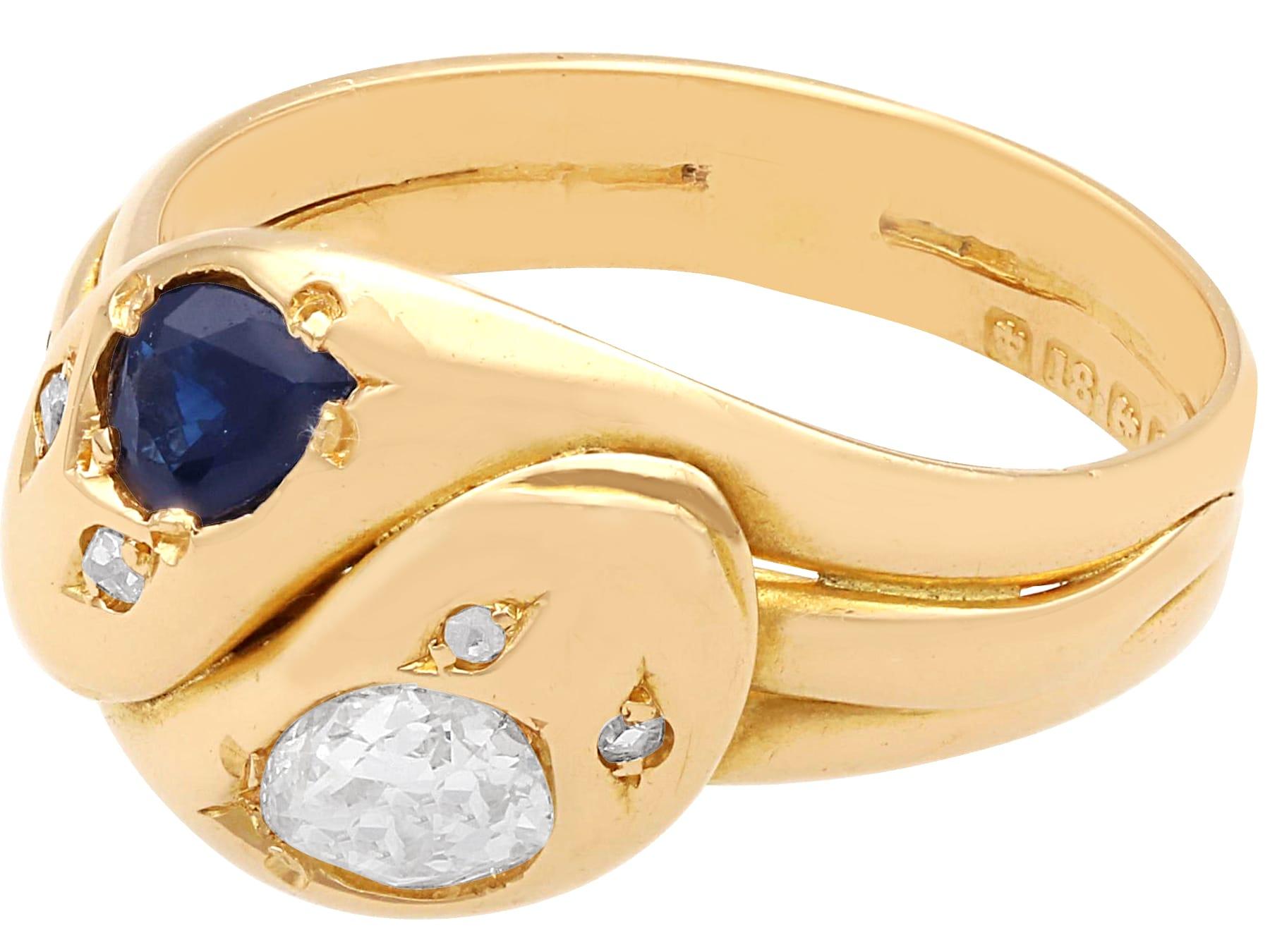 Oval Cut Antique 0.63 Ct Sapphire and 0.77 Ct Diamond, 18 Ct Yellow Gold Snake Ring For Sale