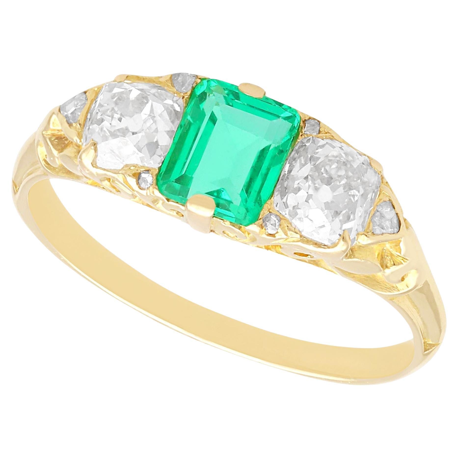 Antique 0.64ct Emerald 0.79ct Diamond 18k Yellow Gold Trilogy Ring, circa 1920 For Sale