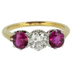 Antique 0.65 Carat Diamond and Ruby Three-Stone Ring