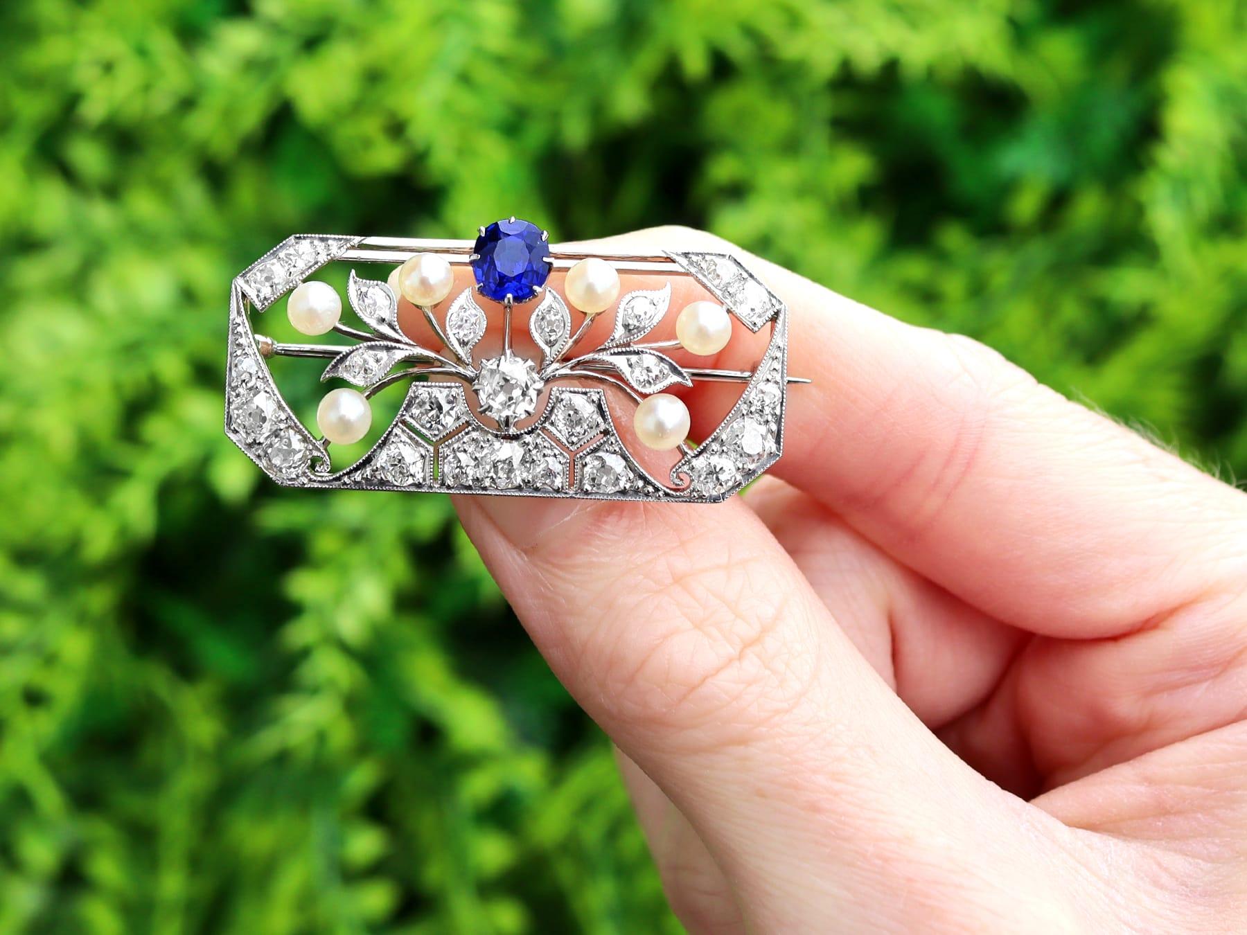 A stunning, fine and impressive 0.65 carat sapphire, 2.77 carat diamond and pearl, 18 karat white gold and platinum set brooch; part of our diverse antique 1920s brooches collection.

This stunning, fine and impressive antique brooch has been