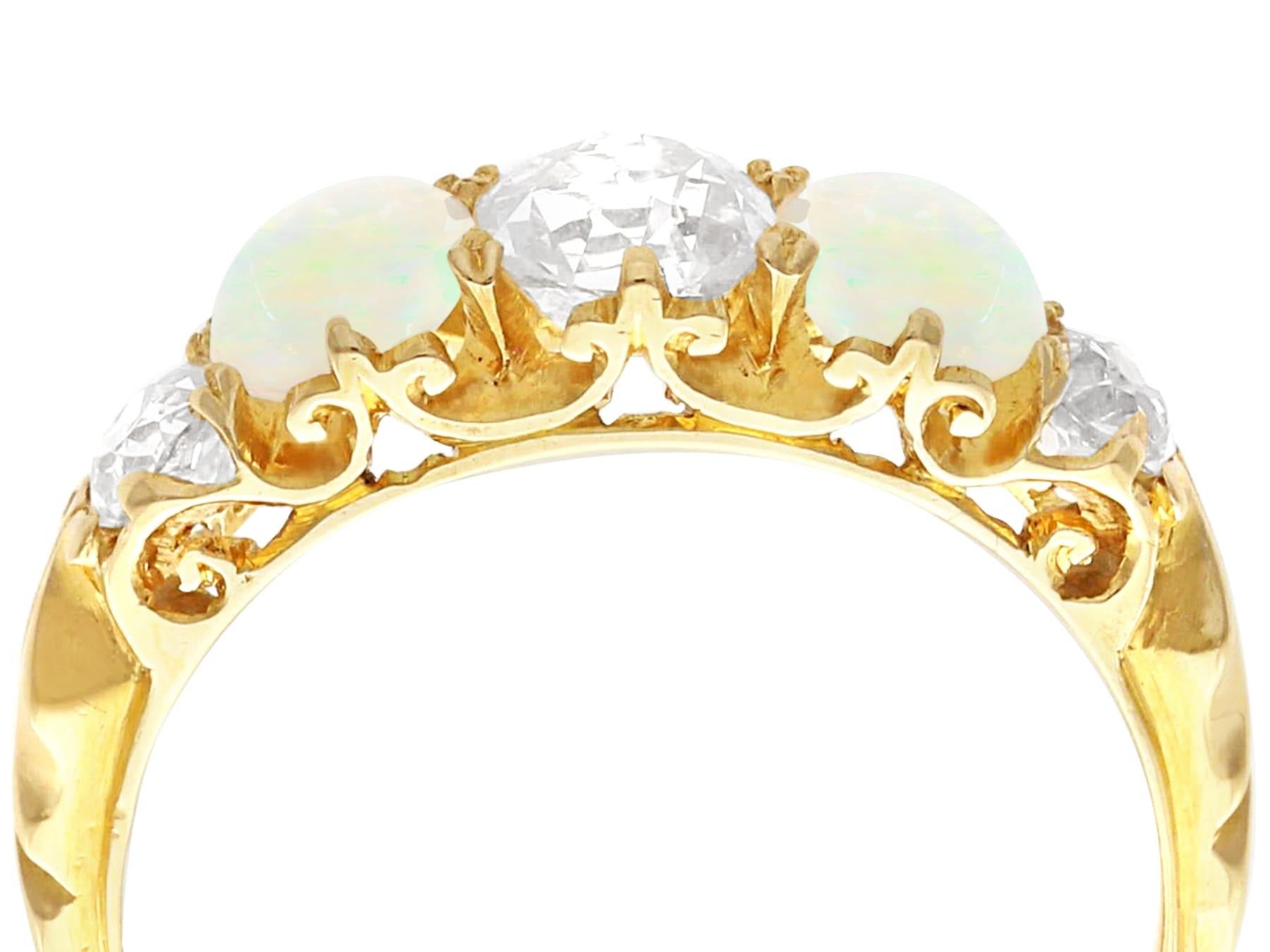 Cabochon 0.68 Carat Opal 1.75 Carat Diamond 18K Yellow Gold Five Stone Ring For Sale