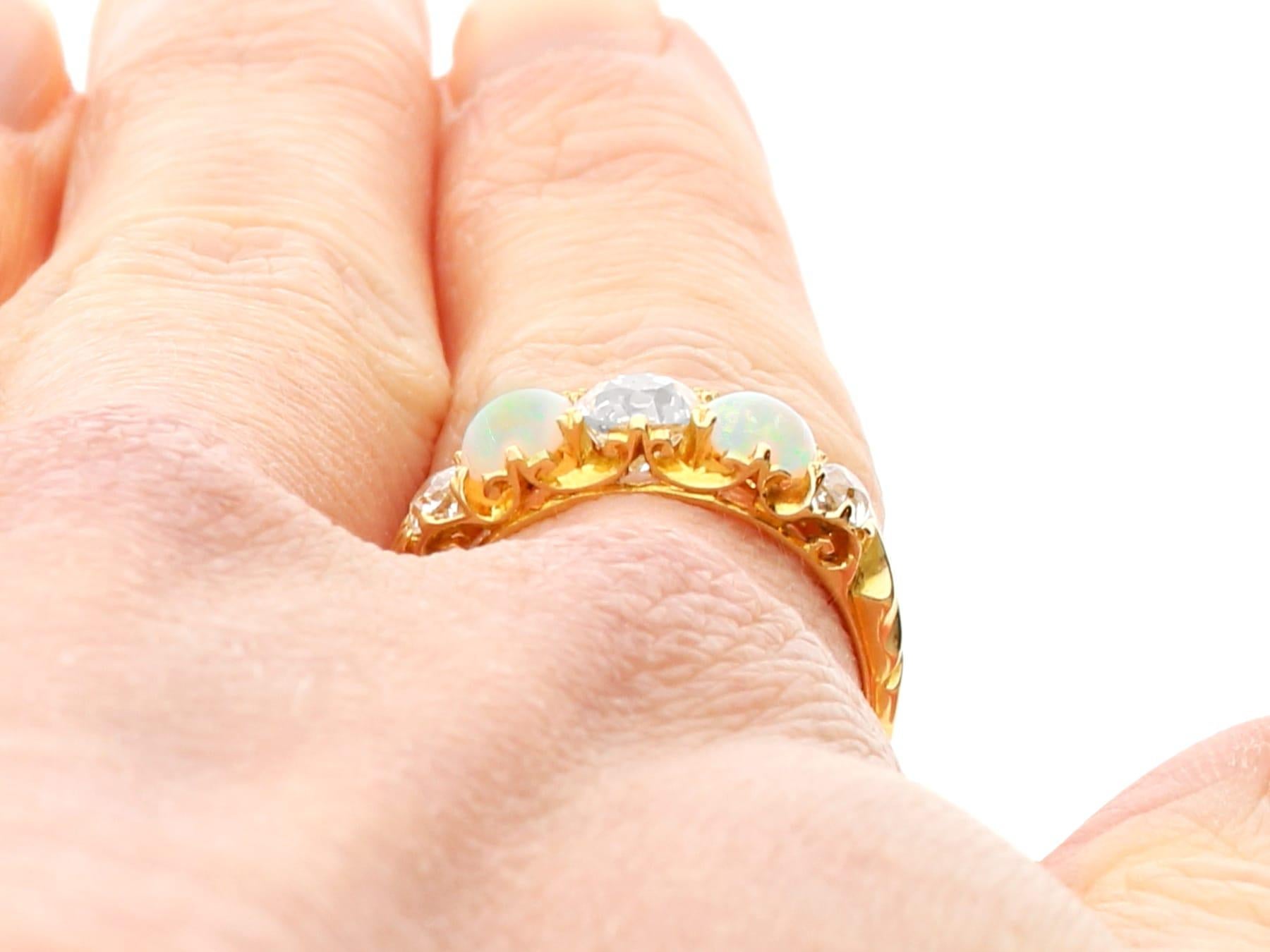 0.68 Carat Opal 1.75 Carat Diamond 18K Yellow Gold Five Stone Ring For Sale 4