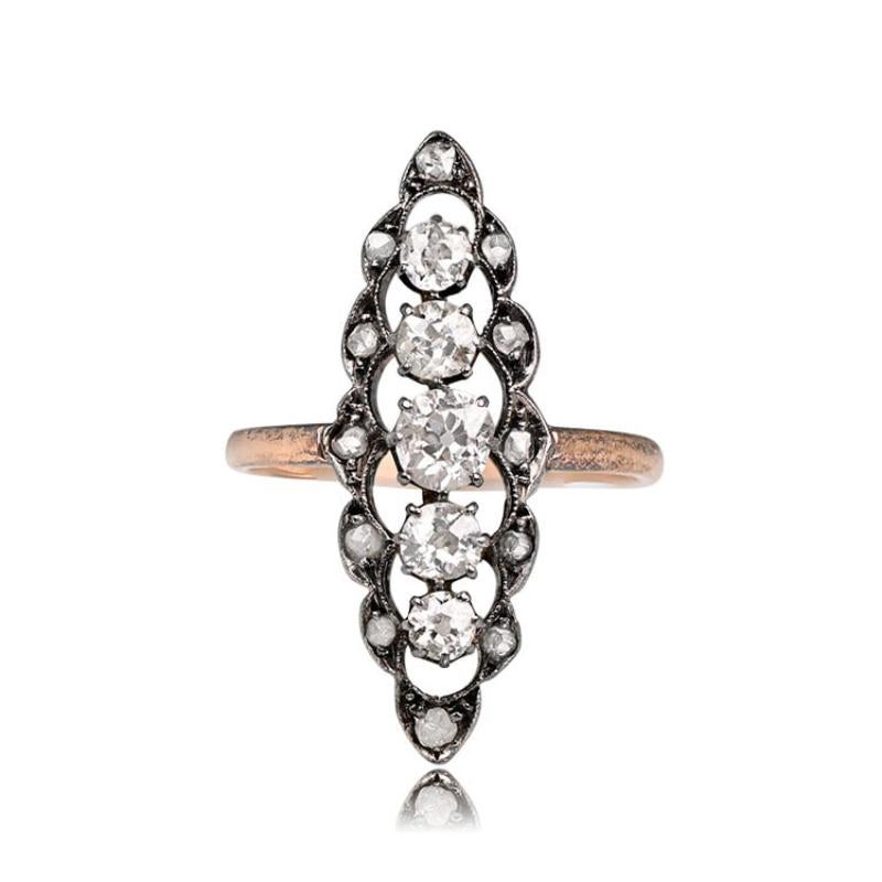 This navette ring is silver on 14k yellow gold. It features a row of five old European cut diamonds set in prongs. The open-work mounting is surrounded by a border of small rose-cut diamonds. The total approximate diamond weight is 0.70 carats, I