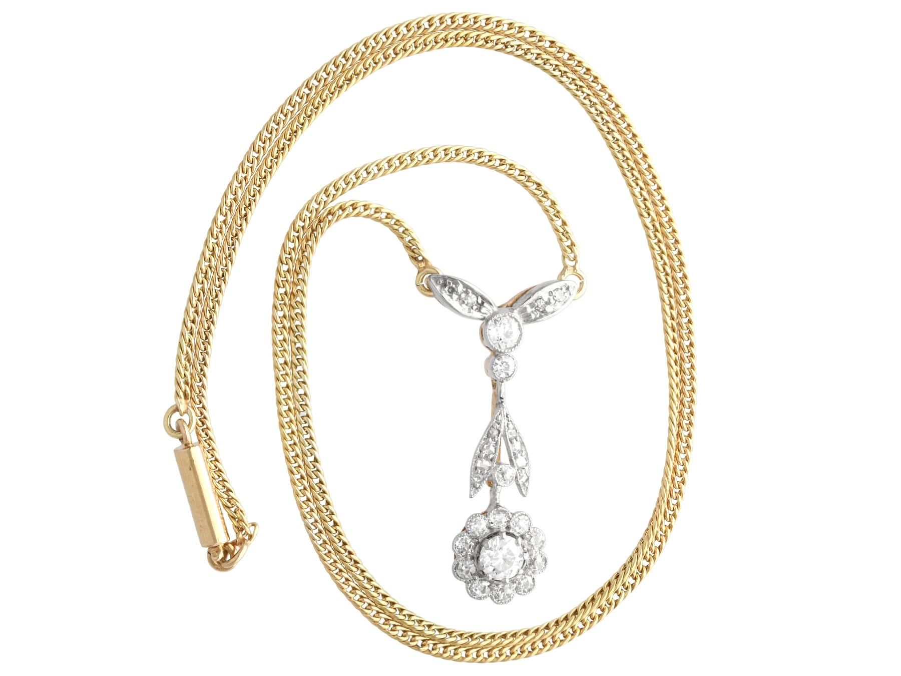 Old European Cut Antique 0.73 Carat Diamond Yellow Gold and Platinum Floral Necklace For Sale