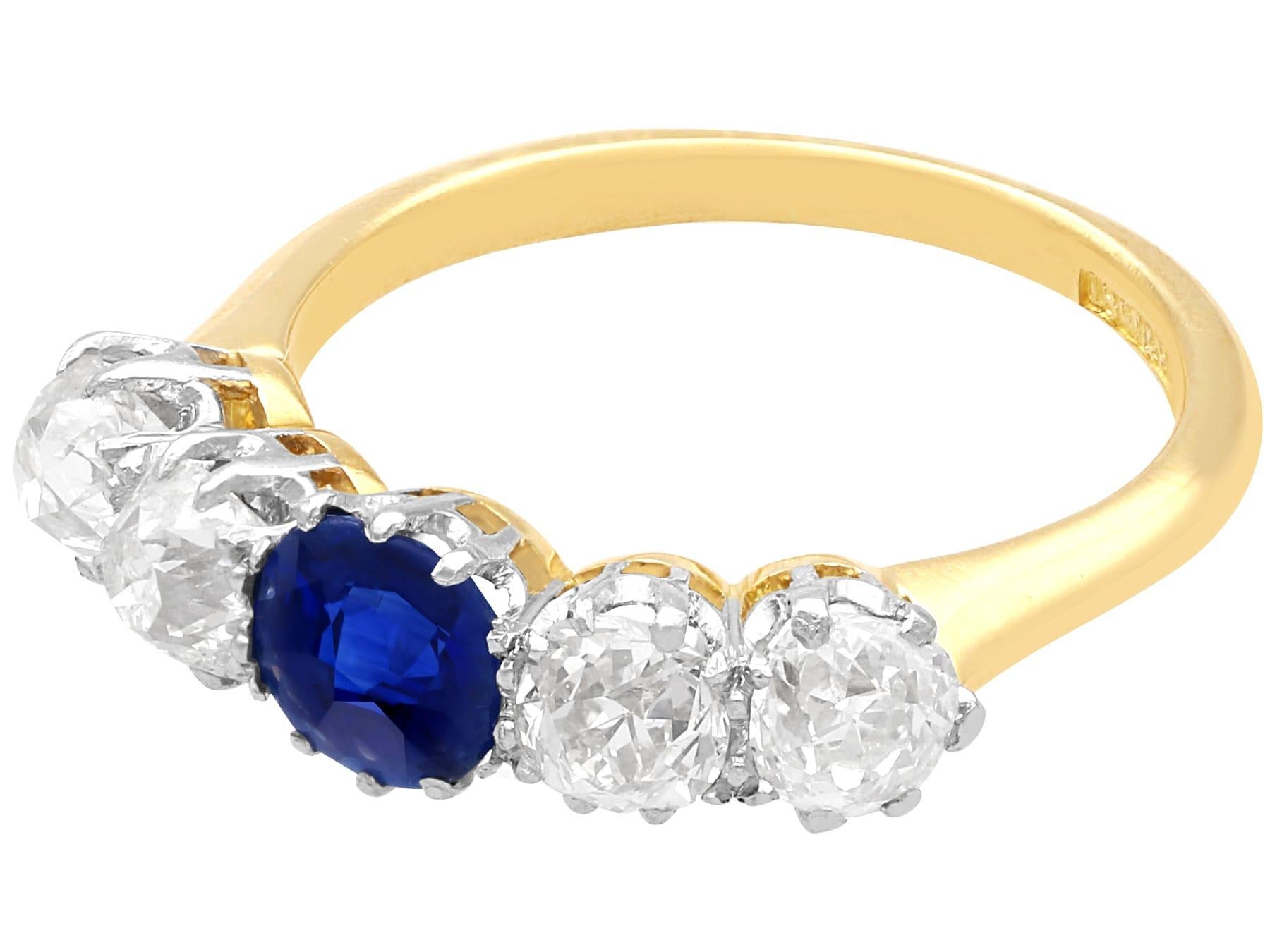 Round Cut Antique 0.75 Carat Sapphire and 1.61 Carat Diamond Yellow Gold Five Stone Ring For Sale