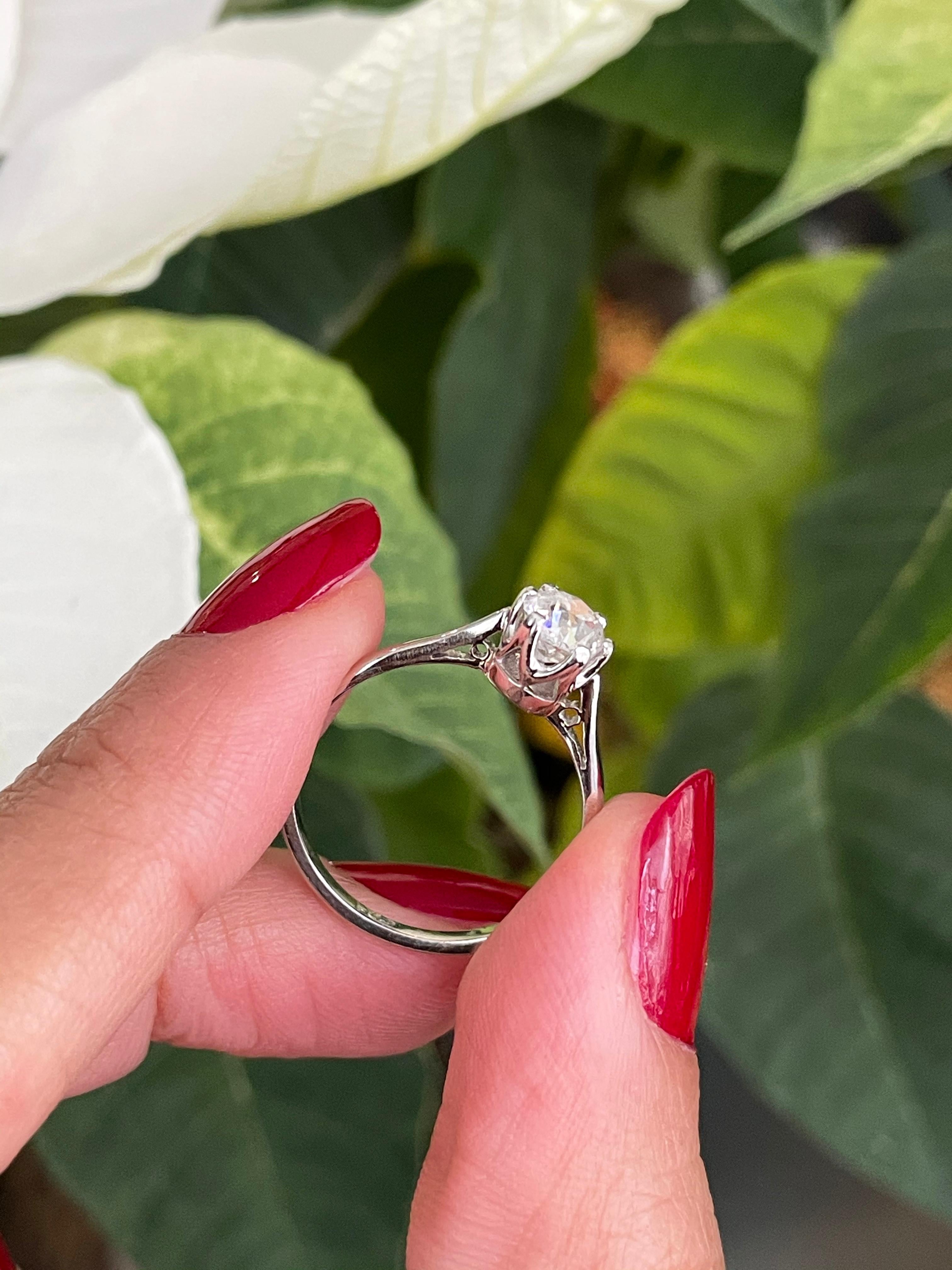 Romantic Antique 0.76 Carat Old Cut Diamond Platinum Engagement Ring, circa 1920s For Sale