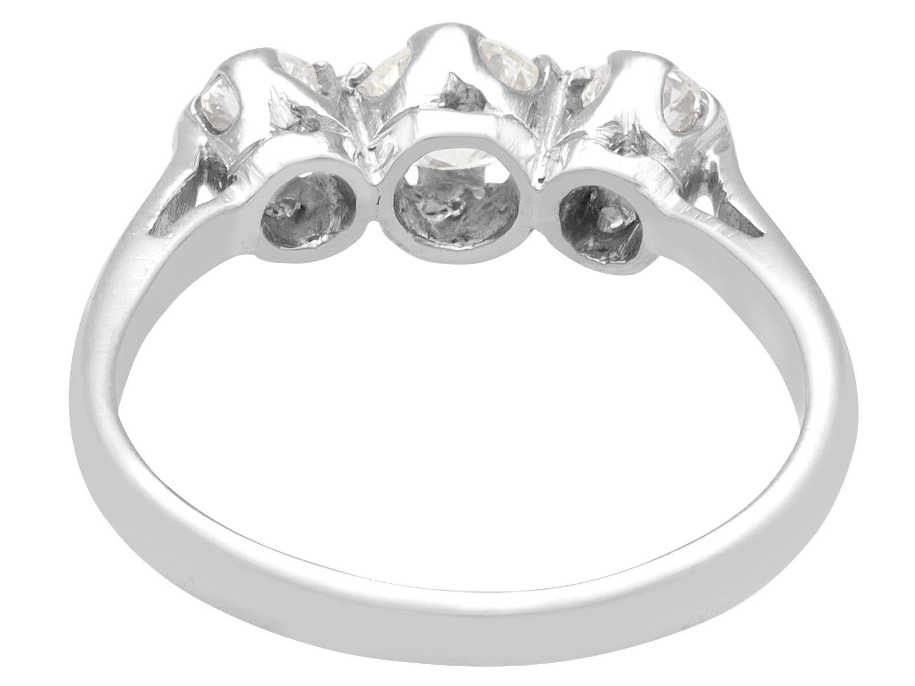 Women's or Men's Antique 0.78 Carat Diamond and 18K White Gold Trilogy Ring For Sale