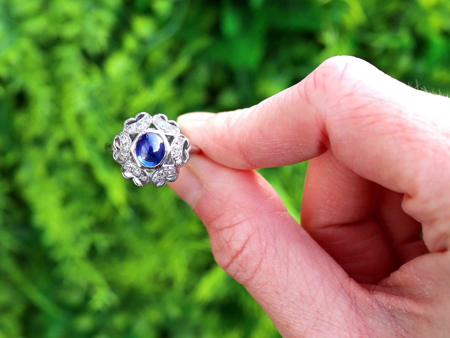 A stunning, fine and impressive antique 0.78 carat sapphire and 0.29 carat diamond, platinum dress ring; part of our diverse collection of cabochon rings.

This stunning, fine and impressive antique sapphire and diamond ring has been crafted in