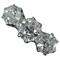 Antiker 0,7 Karat Diamant im Altschliff und Platin Trilogie-Ring
