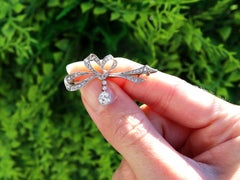 Antique 0.81 Carat Diamond, 15k Yellow Gold Bow Brooch Circa 1900