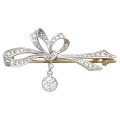 Antique 0.81 Carat Diamond, 15k Yellow Gold Bow Brooch Circa 1900