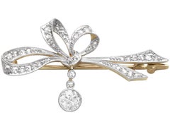 Antique 0.81 Carat Diamond, 15k Yellow Gold Bow Brooch Circa 1900