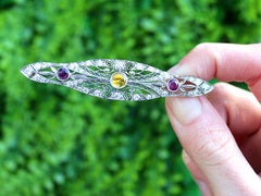 Antique 0.85 Carat Yellow Sapphire Ruby and 1.42 Carat Diamond Brooch