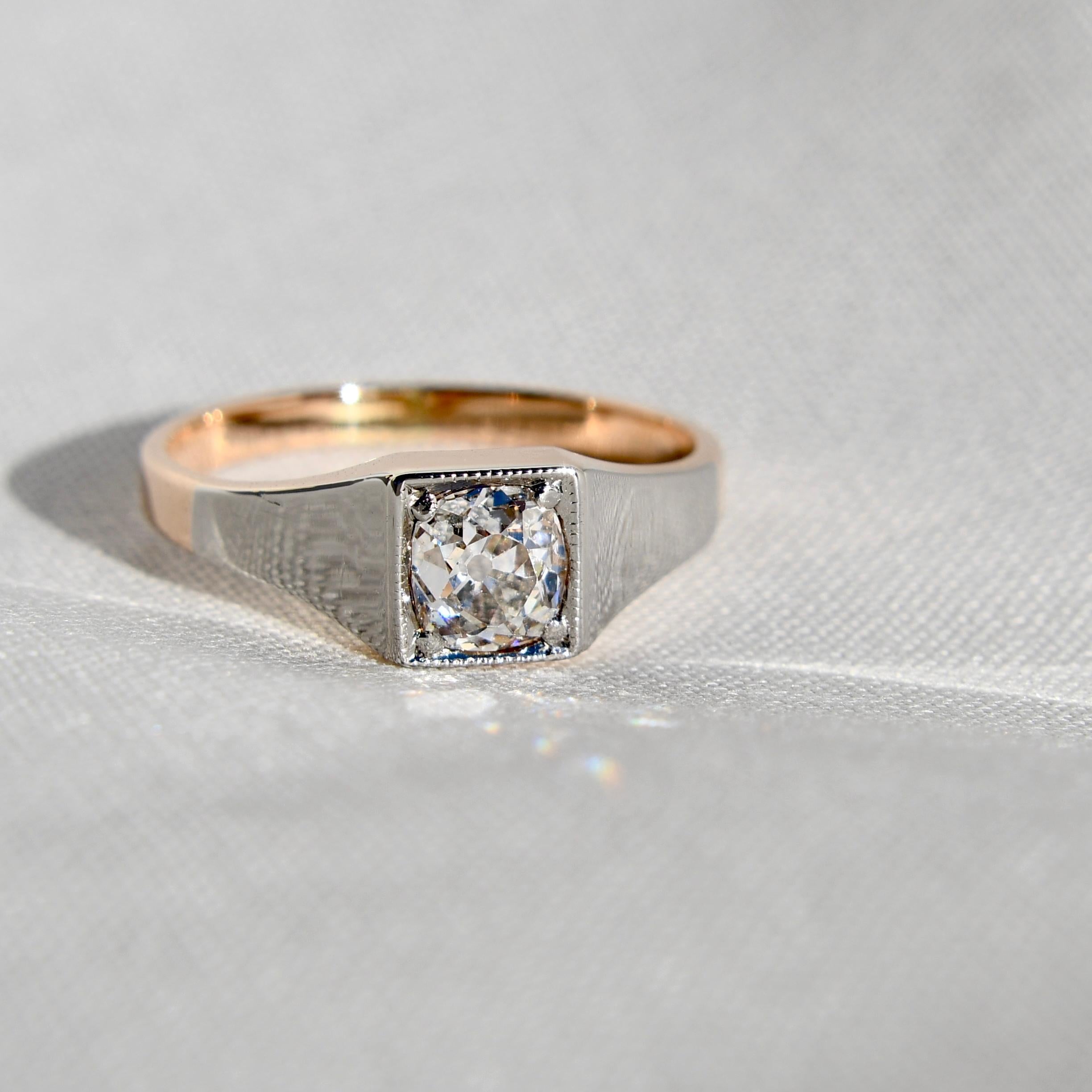 This ring was made in Germany around 1910 and is in excellent, antique condition. 

A GIA certificate for the diamond is included.

- One old mine cut diamond, 5.50 x 5.00 x 3.99 mm/ 0.89ct (J/ SI1) 
- 585/ 14 ct yellow gold and platinum (hallmarked
