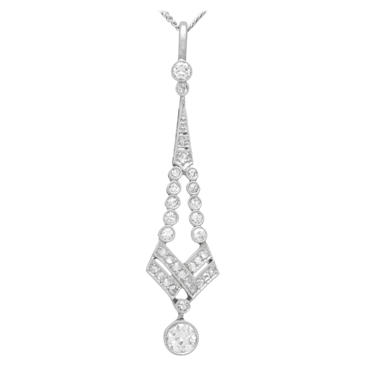 Ciondolo antico in platino e diamanti da 0.90 carati