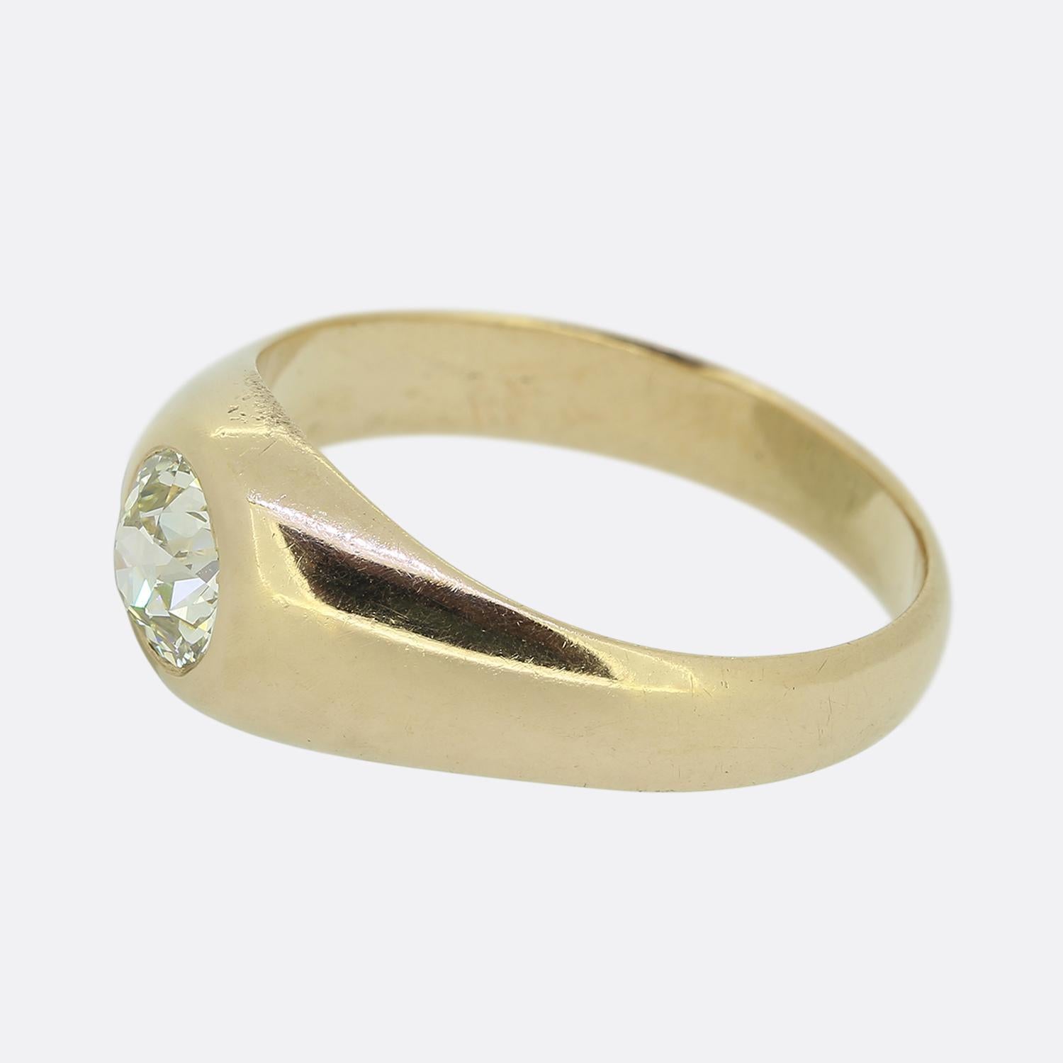Here we have a classically styled diamond single stone ring. This antique piece has been crafted from 18ct yellow gold and plays host to a single bezel set old mine cut diamond amidst plain wide shoulders.

Condition: Used (Very Good)
Weight: 4.4