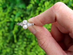 Antique 0.92 Carat Diamond and Pearl Platinum Cocktail Ring Circa 1910