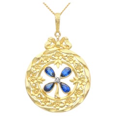 Antique 0.98 Carat Sapphire and Diamond 18K Yellow Gold Pendant