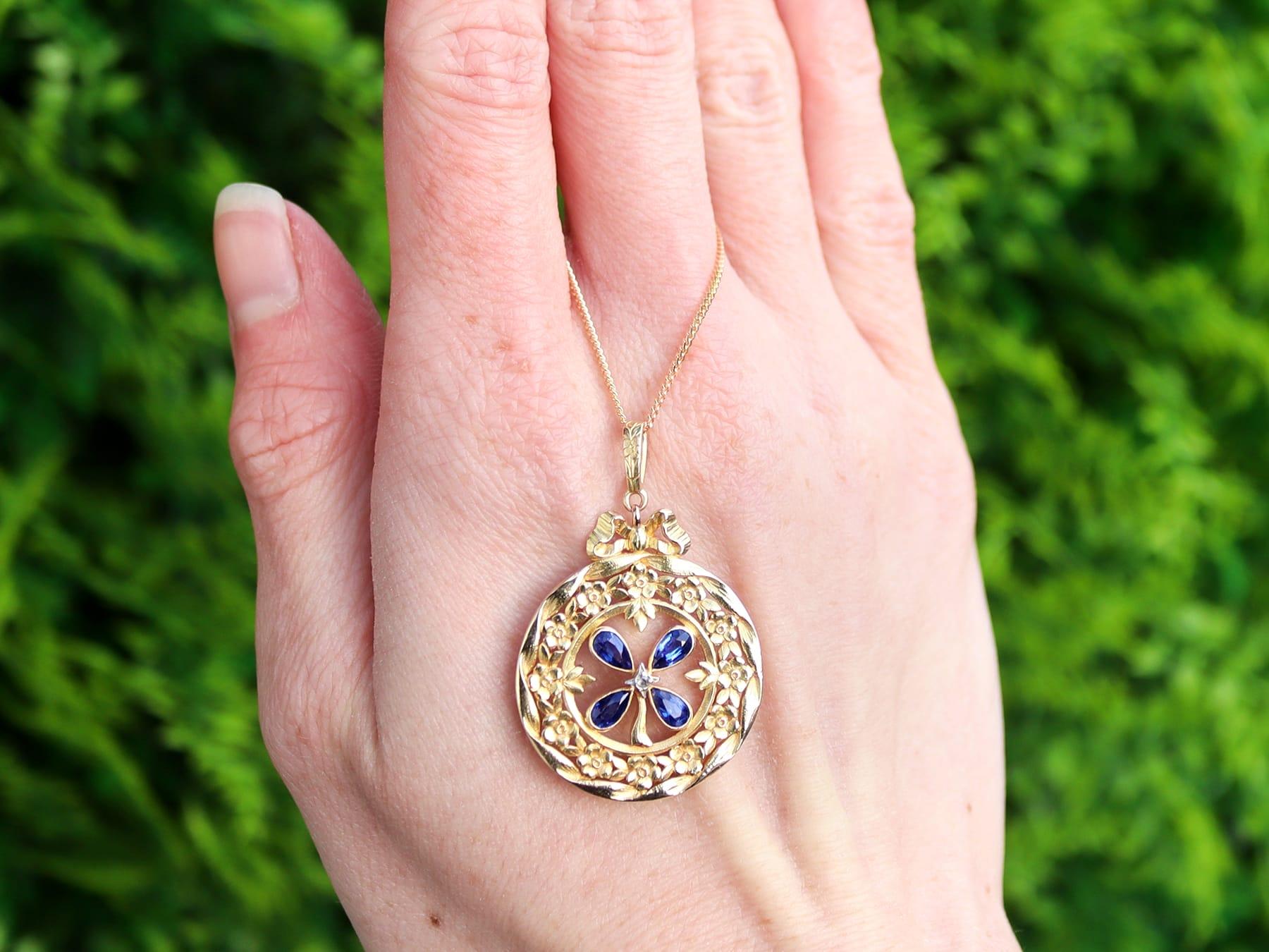 A stunning, fine and impressive antique 0.98 carat blue sapphire and 0.01 carat diamond, 18 karat yellow gold pendant; part of our antique jewellery and estate jewelry collections.

This stunningantique pendant has been crafted in 18K yellow gold