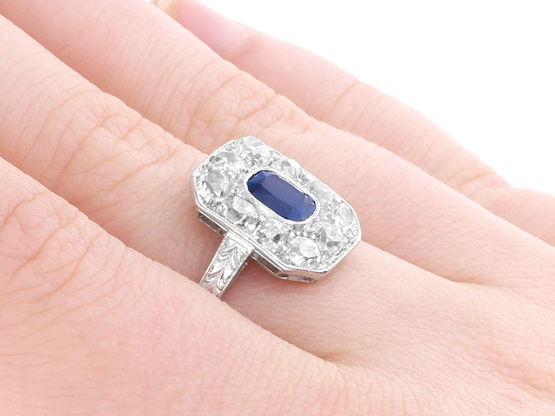 Antique 1 Carat Sapphire and 1.10 Carat Diamond Platinum Cluster Ring For Sale 4