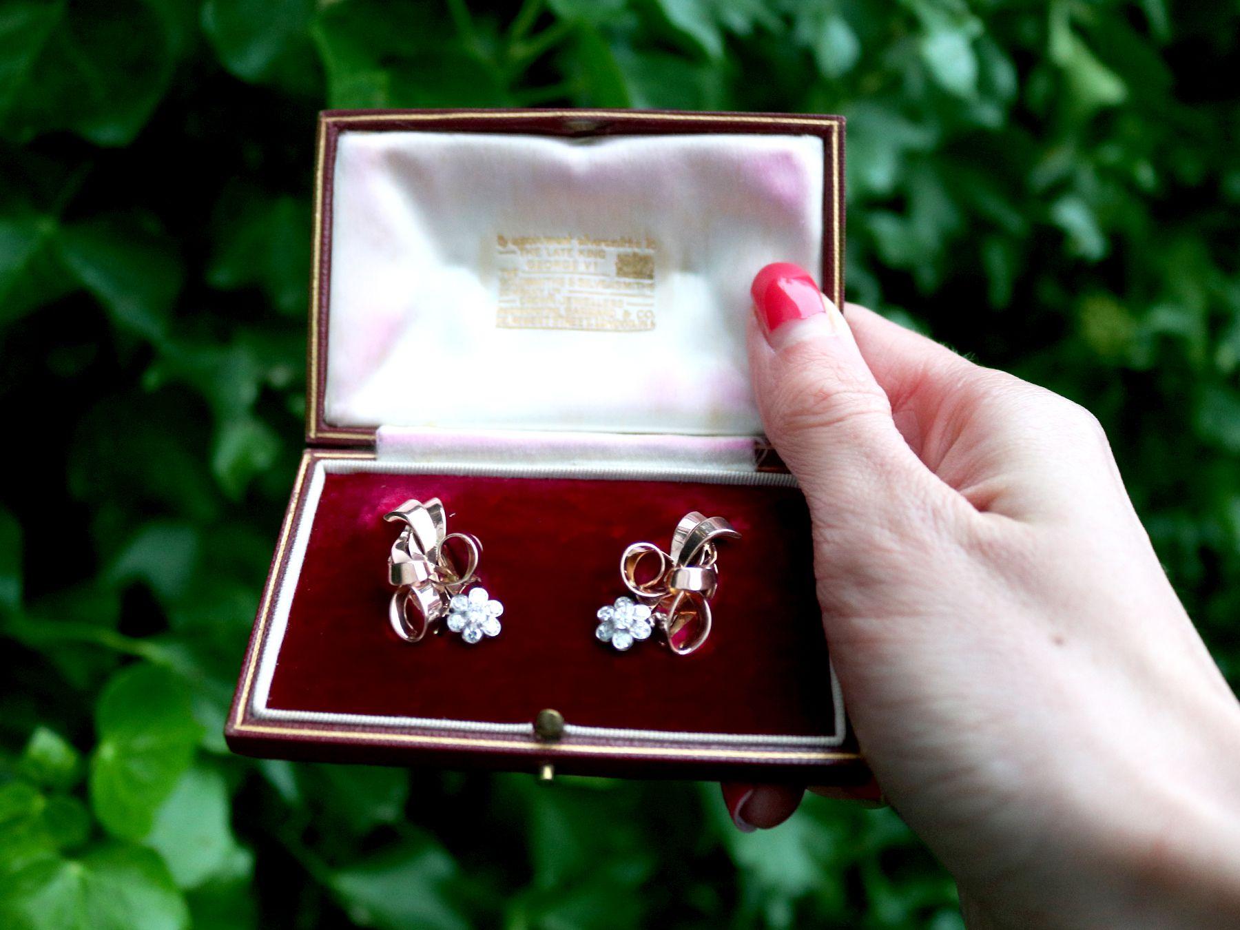 A stunning, fine and impressive pair of antique 1.00 carat diamond, 15 and 12 karat rose gold, platinum set clip on earrings; part of our antique jewellery and estate jewelry collections.

These stunning, fine and impressive antique earrings are