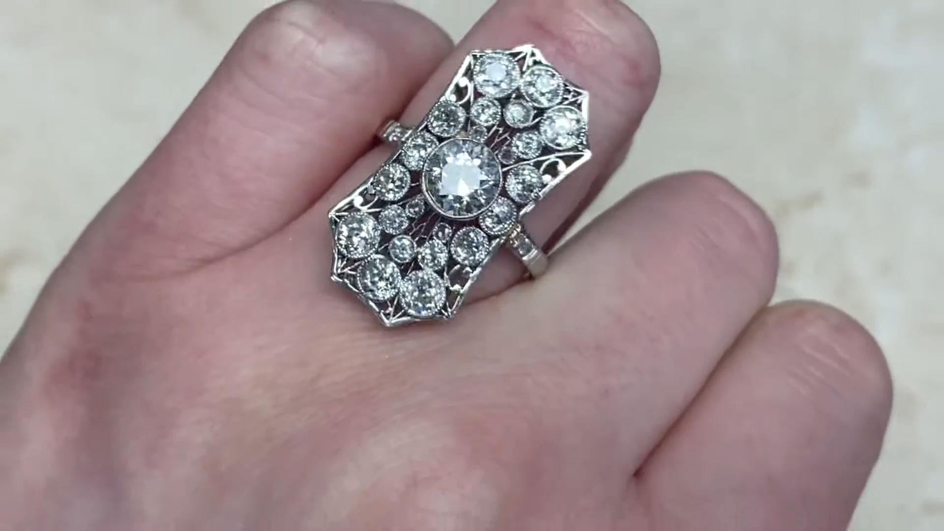 A stunning and original Edwardian-era ring, exquisitely hand-crafted in platinum circa 1910. This magnificent piece features a dazzling old European cut center diamond, weighing approximately 1-carat, with an elegant I color and SI1 clarity.