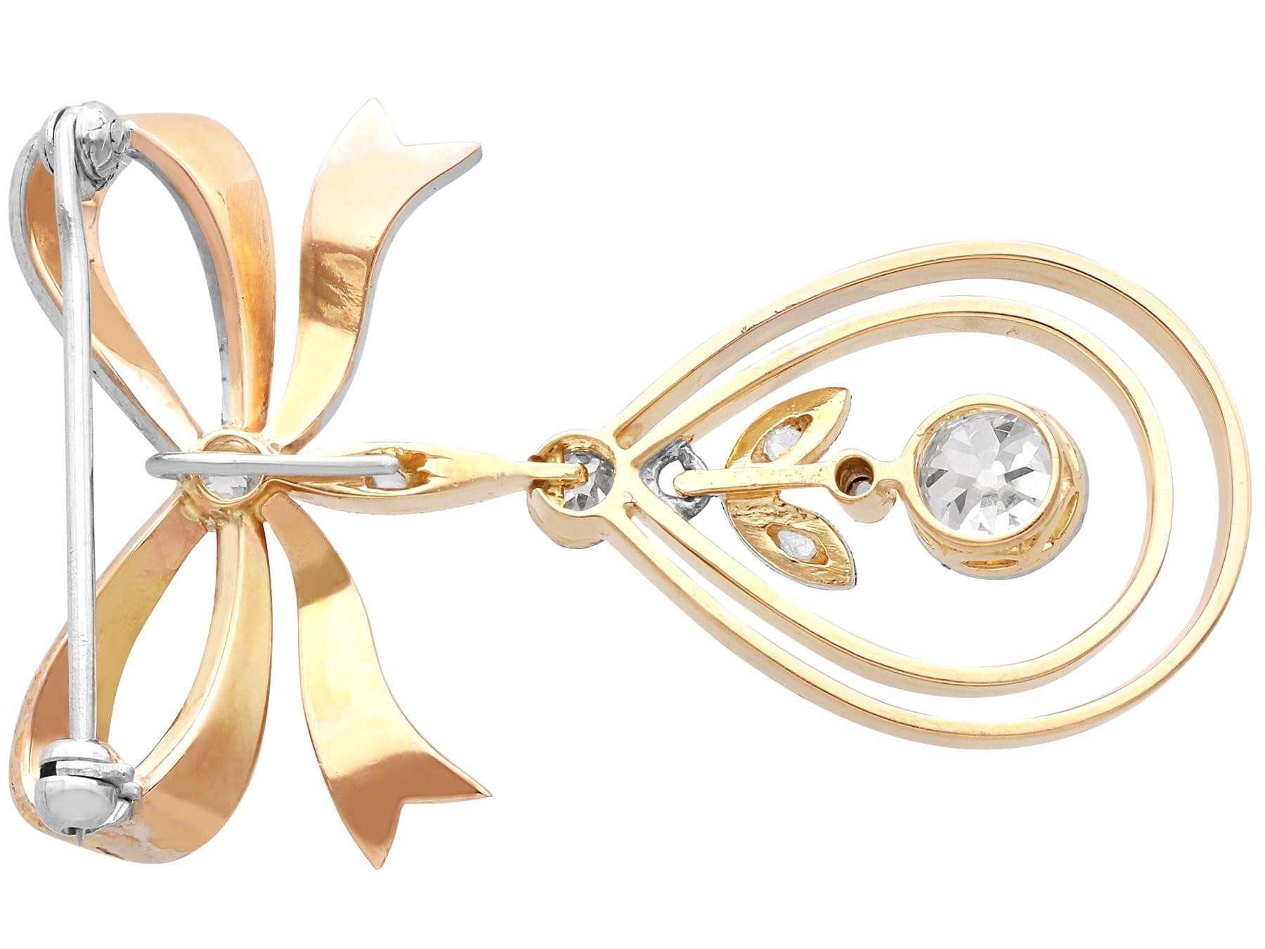Antique 1.00Ct Diamond and 14k Yellow Gold Bow Brooch / Pendant Circa 1920 For Sale 1