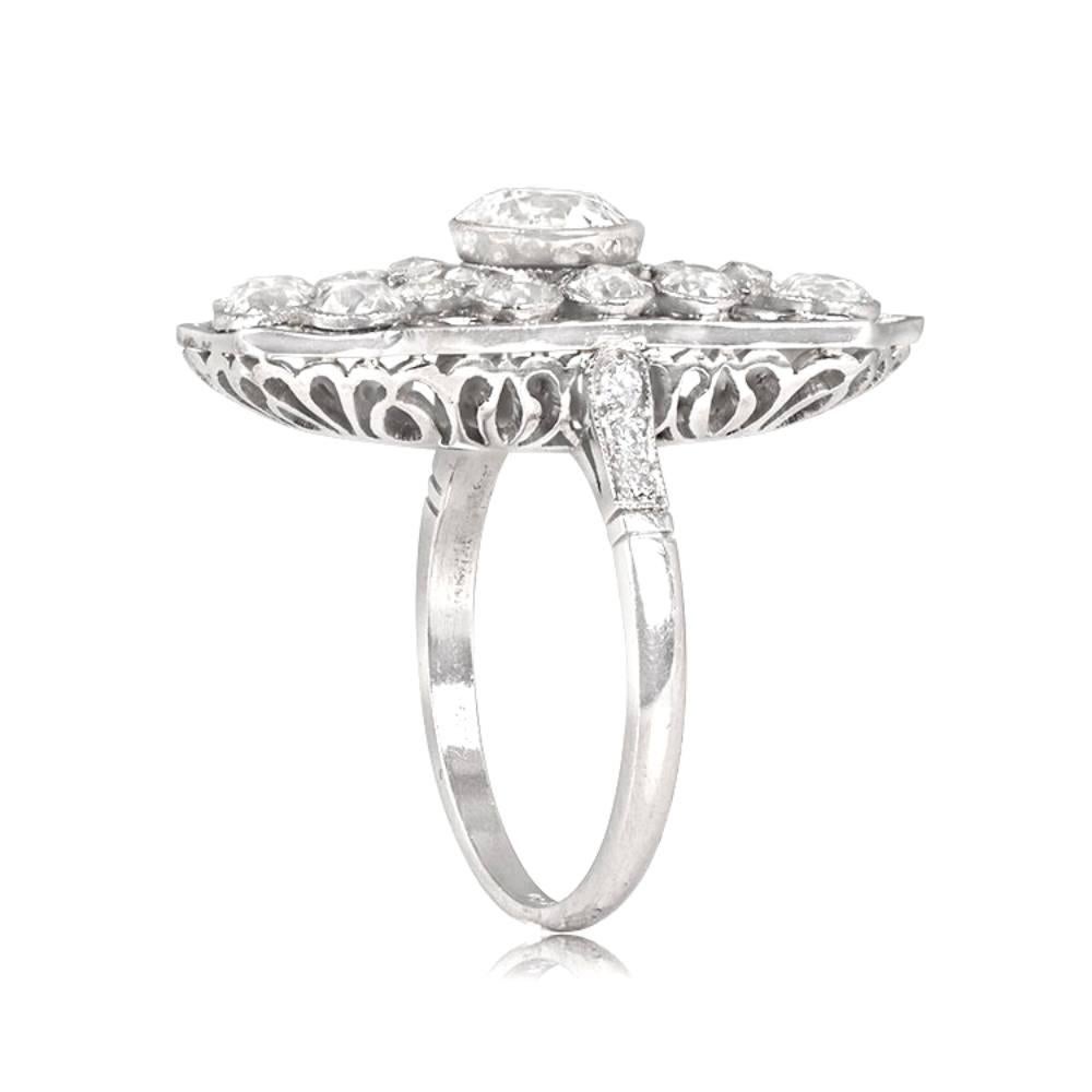 This magnificent platinum cluster ring boasts a 2.18-carat high-quality natural emerald cut emerald that exudes sophistication and elegance. The center stone is surrounded by a cluster of old European cut diamonds, which adds to the brilliance and