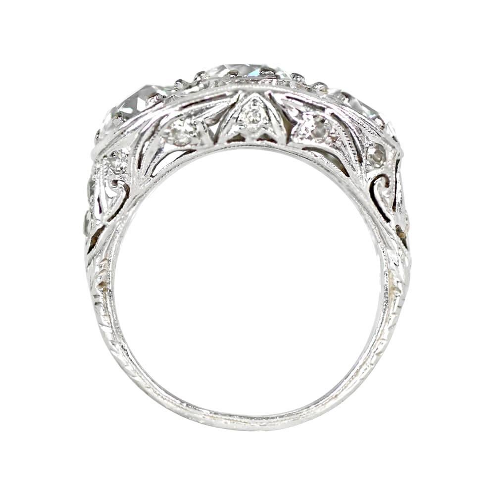 Art Deco ring with 3 old European cut diamonds (1.00ct each, I-J color, VS1-VS2 clarity) in octagonal pronged bezels. Openwork platinum mount with lattice top, geometric floral design on shoulders and under-gallery set with 0.22ct single-cut